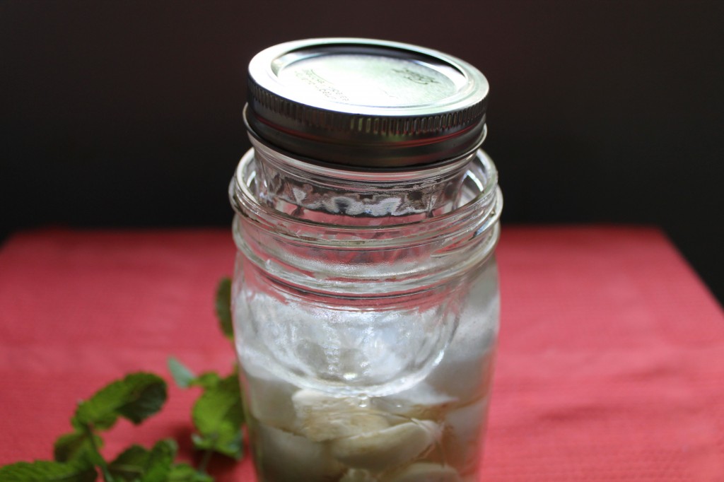 using a jar to submerge vegetables for lactic acid fermentation