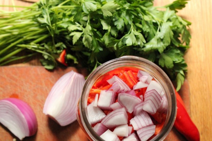 onions and parsley in a jar