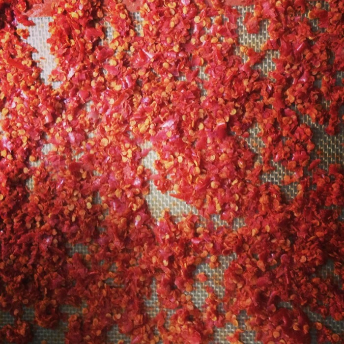 Spicy red pepper flakes are the by product of fermented hot pepper sauce