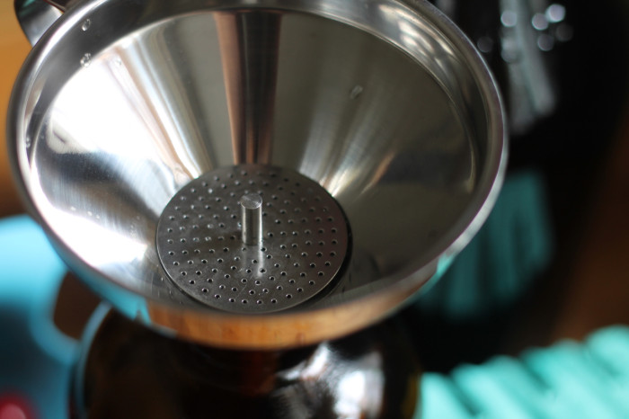 This strainer/funnel is the (cherry) bomb. It has a removable strainer that is easily cleaned and allows you to use it as just a funnel when its straining capabilities are not needed. You can win one, below!
