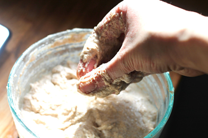Scrape as much leaven off your fingers as you can after mixing, and clean up the sides of your bowl. 